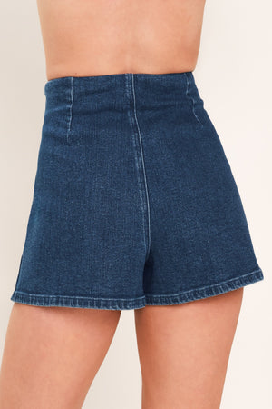 Medium indigo Flying Tomato denim skort with ruching detail, featuring a stylish and comfortable design.