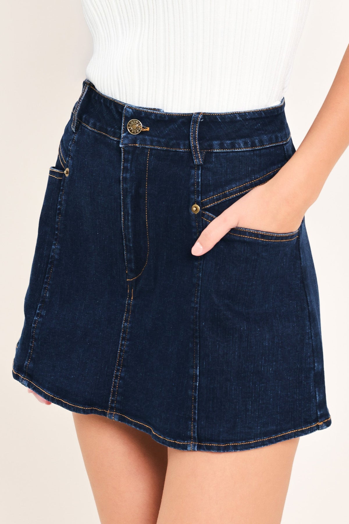 Dark indigo denim skort from Flying Tomato featuring a classic design and front pockets, perfect for casual wear.