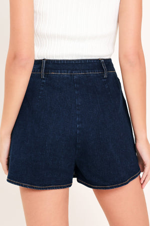 Dark indigo denim skort by Flying Tomato featuring a casual, stylish design with front pockets and a comfortable fit.