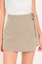 Flying Tomato modern stripe woven skort in brown with a stylish, lightweight design and classic striped pattern.