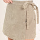 Flying Tomato modern stripe woven skort in brown with white and beige vertical stripes, stylish and comfortable for casual wear.