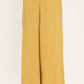 Flying Tomato Golden State of Mind woven pants in mustard color with a relaxed fit and intricate woven pattern.