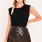 Brown lacquer-finish faux leather skort by Flying Tomato featuring a sleek, modern design and a fitted silhouette.