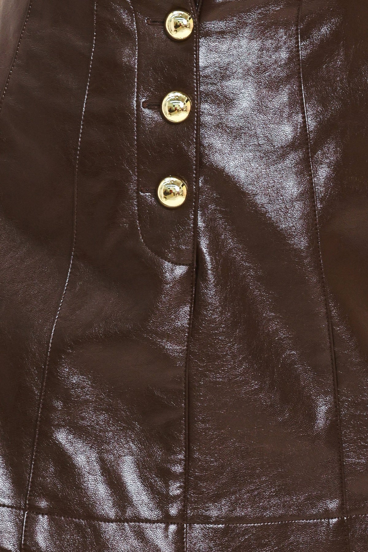 Dark brown faux leather skort from Flying Tomato featuring a sleek lacquer finish and stylish design.