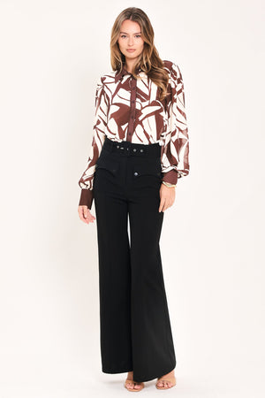 Black woven pants from Flying Tomato BARK AND BONE collection, featuring a textured fabric and relaxed fit.
