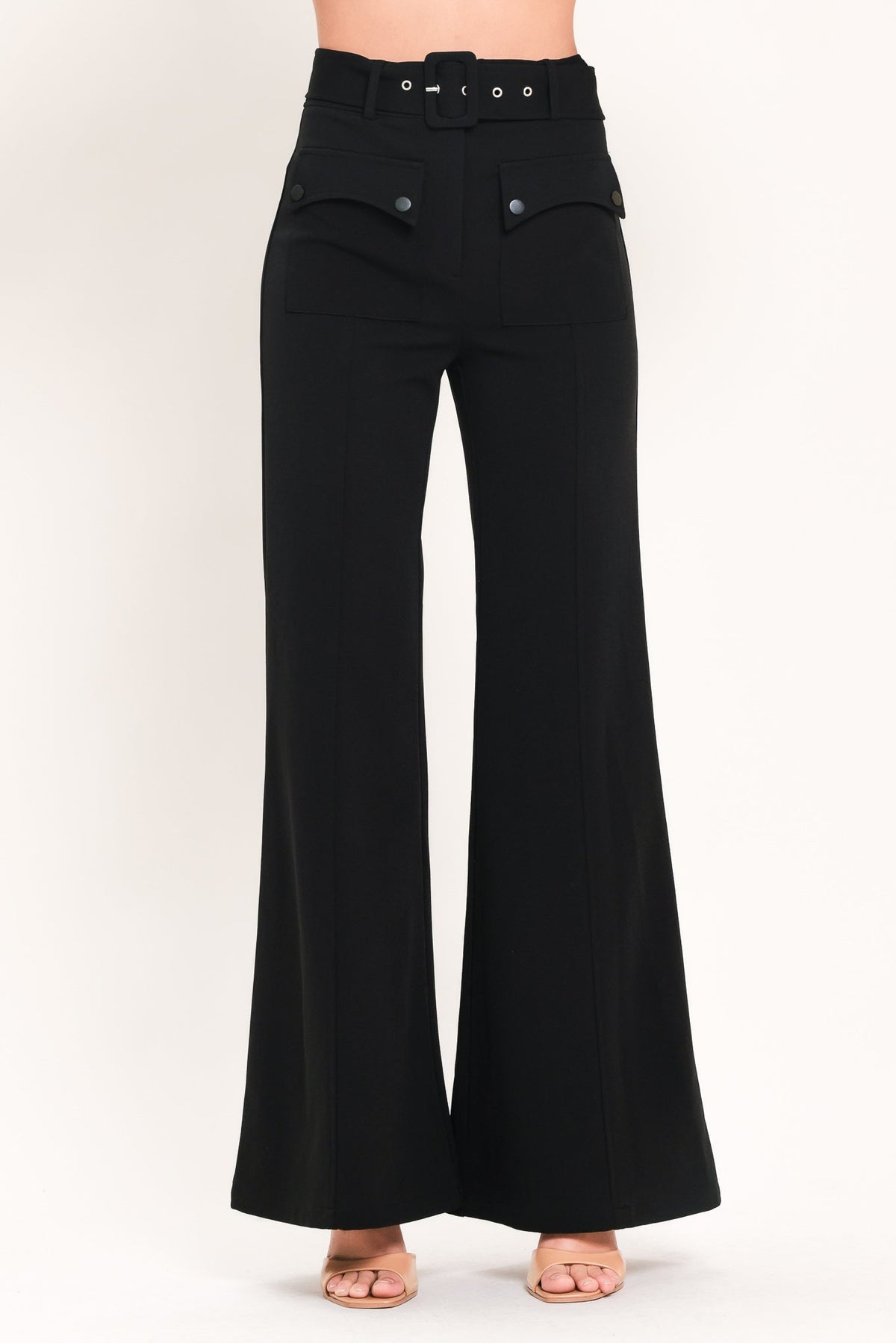 Black woven pants by Flying Tomato featuring a textured, relaxed fit with a stylish, casual design.