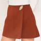 Rust-colored Flying Tomato spiced horizon Tencel side-zip skort with front and back pockets, casual and comfortable design.