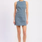 Emory Park Mabel Mini Dress in blue denim, shown on a model, with a fitted silhouette and sleeveless design.
