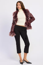 Emory Park Soraya fur jacket in burgundy, stylish outerwear with plush fur details, shown on a hanger.