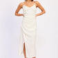 White Coralie Midi Dress by Emory Park, showcasing its elegant design and flowing fabric in a close-up image.