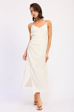 Emory Park Coralie midi dress in white, showcasing a stylish sleeveless design with a flowy fabric and elegant silhouette.