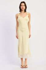 Emery Park buttery yellow midi dress with sleeveless design and fitted waist, displayed on a hanger.