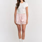 Pink Fern Mini Shorts by Emory Park, showcasing lightweight fabric and stylish design perfect for casual wear.