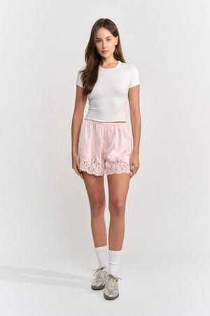 Pink Fern Mini Shorts by Emory Park, showcasing lightweight fabric and stylish design perfect for casual wear.
