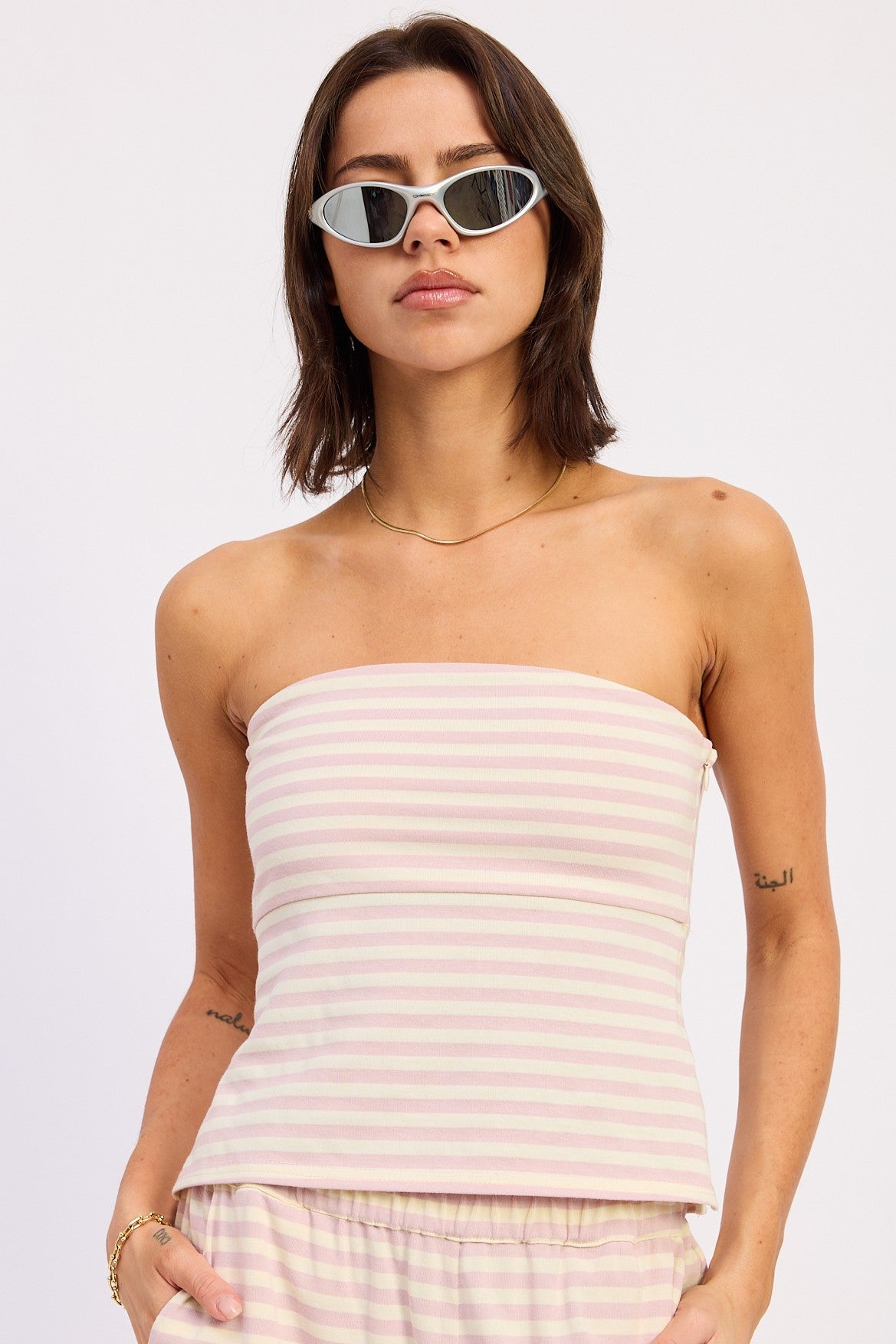Pink ivory striped Nerina Tube Top from Emory Park, featuring a fitted design and lightweight fabric.