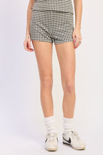 Emory Park Vivia Shorts in black gingham fabric with a relaxed fit, displayed on a flat surface for casual summer wear.