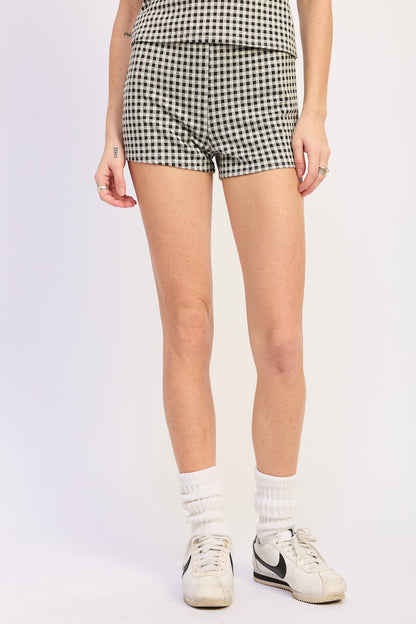 Emory Park Vivia Shorts in black gingham fabric with a relaxed fit, displayed on a flat surface for casual summer wear.