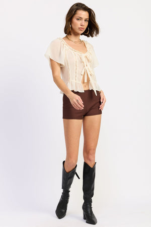 Emory Park Terri Shorts in brown, casual summer shorts with a relaxed fit and lightweight fabric, shown on a model.