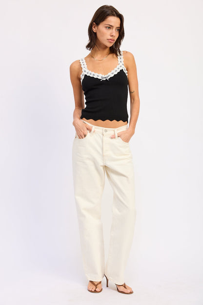 Black Aruna top from Emory Park, stylish sleeveless blouse with a relaxed fit and subtle detailing.