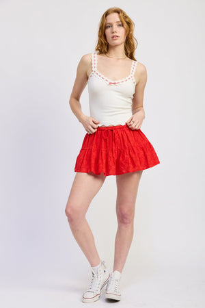 Off-white Aruna Top by Emory Park, stylish sleeveless blouse with a relaxed fit and subtle neckline details.