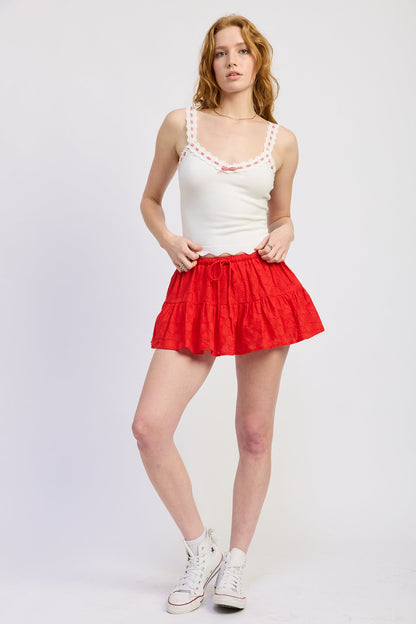 Off-white Aruna Top by Emory Park, stylish sleeveless blouse with a relaxed fit and subtle neckline details.