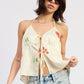 Emory Park Mirella halter top in ivory multi with floral print, sleeveless design, and tie-back style.