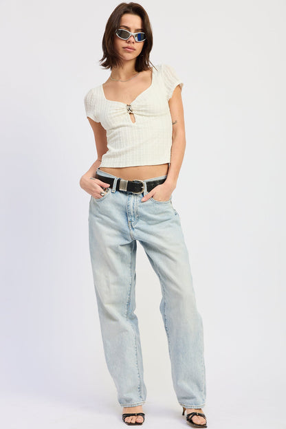 White Clover Top by Emory Park, a stylish and comfortable women's blouse with a relaxed fit and elegant design.