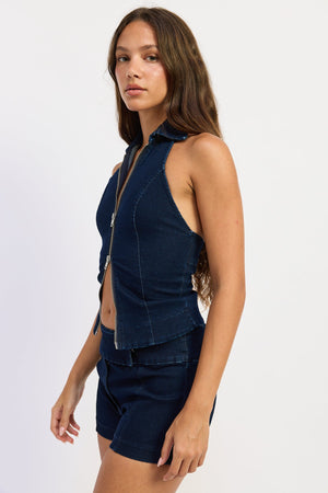 Dark denim Violette vest top by Emory Park, sleeveless design with a fitted silhouette, displayed on a hanger.