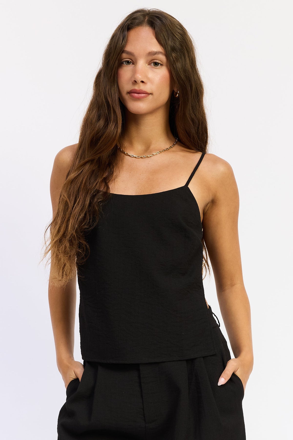 Black Emory Park Melanie Top, stylish sleeveless blouse with a relaxed fit, perfect for casual or office wear.