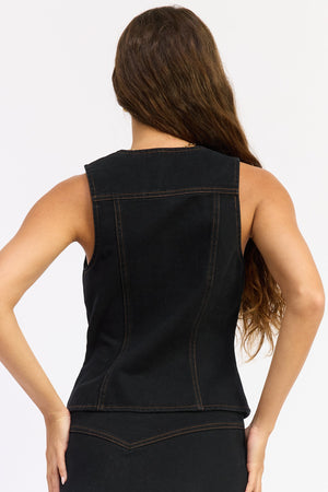 Black Zaylee top by Emory Park, featuring a stylish design with a comfortable fit, displayed on a hanger on a plain background.
