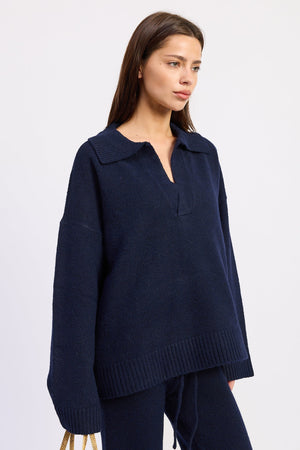 Navy Aramelle oversized sweater by Emory Park, soft knit fabric, relaxed fit, with long sleeves and cozy design.