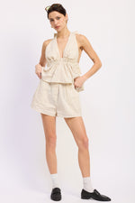 Cream and mocha striped Alivia halter top by Emory Park, featuring a stylish halter neckline and lightweight fabric.