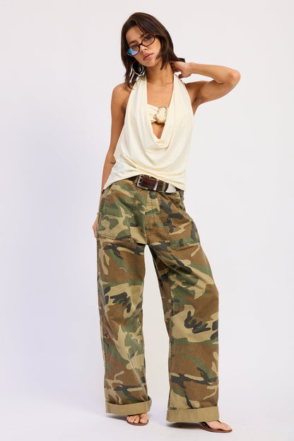 Emory Park Orelia Cowl Top in ivory, stylish sleeveless blouse with a soft draped cowl neckline, shown on a model.