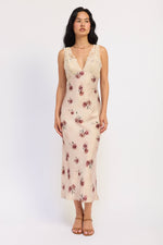 Emory Park Jillian midi dress in pale blush, featuring a flowy fabric and elegant design, perfect for casual or formal occasions.