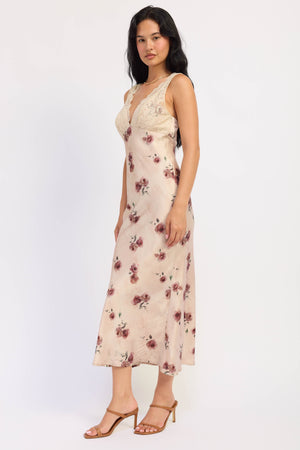 Emory Park Jillian midi dress in pale blush fabric, featuring a flowy silhouette and elegant design, suitable for casual or semi-formal wear.