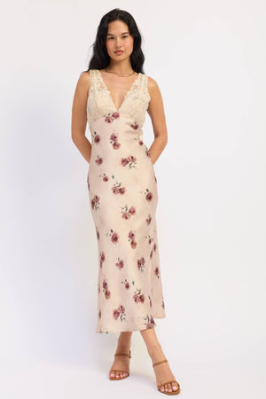 Emory Park Jillian midi dress in pale blush fabric, showcasing a flowing, elegant design perfect for casual or formal occasions.