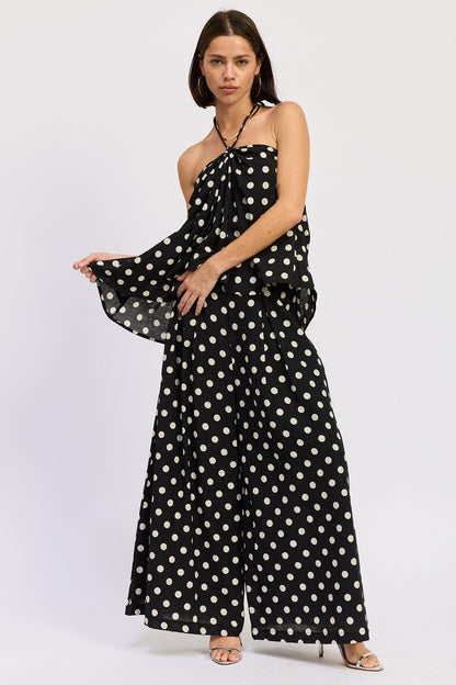 Black polka dot Alice halter top by Emory Park, featuring a stylish neckline and relaxed fit, perfect for casual wear.