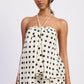 Ivory polka dot Alice halter top by Emory Park, featuring a stylish neckline and tied back design.