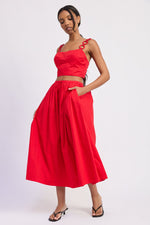 Red Poppy crop top by Emory Park, featuring a stylish design, fitted silhouette, and crop length for a trendy look.