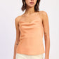 Emory Park Ismene Top in apricot color, showcasing lightweight fabric and stylish design, perfect for casual or dressy occasions.