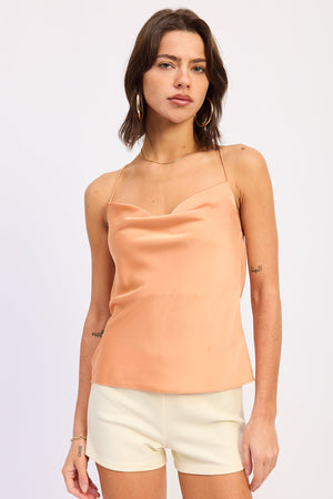 Emory Park Ismene Top in apricot color, showcasing lightweight fabric and stylish design, perfect for casual or dressy occasions.