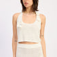 Emory Park Isolde Ivory halter top with strap details, sleeveless design, and a stylish, modern look for casual or dressy occasions.