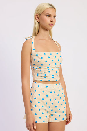 Emory Park Lola Top in ivory and blue polka dot, casual sleeveless blouse with ruffled details and round neckline.