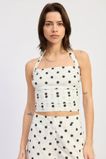 Emory Park Lola top in off-white and black polka dot pattern, stylish sleeveless blouse with a round neckline.
