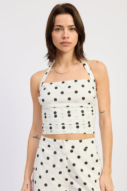 Emory Park Lola top in off-white and black polka dot pattern, stylish sleeveless blouse with a round neckline.