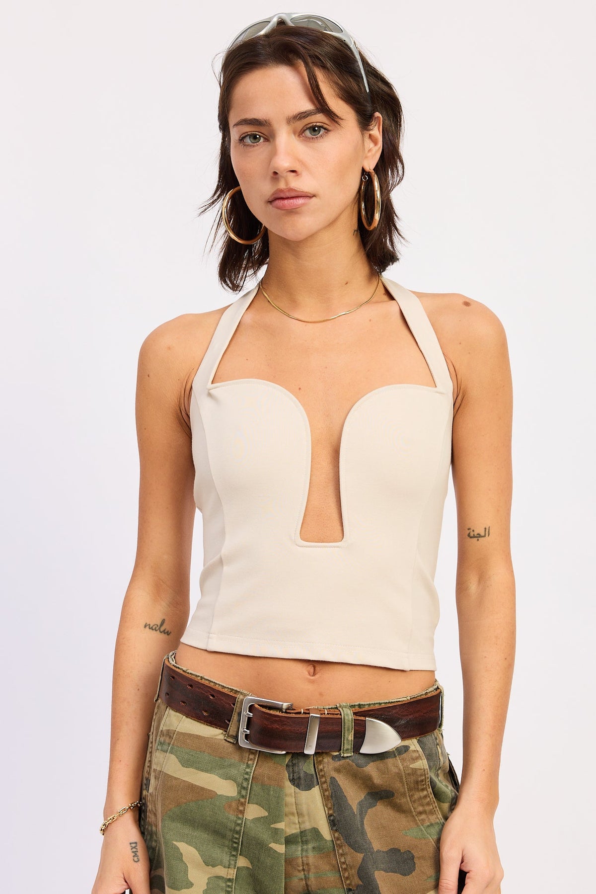 Beige Emory Park Haven Top, a stylish women’s blouse with a relaxed fit and elegant neckline, shown on a model.