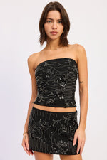 Black Iris Tube Top by Emory Park featuring a sleek, fitted design perfect for casual and stylish outfits.