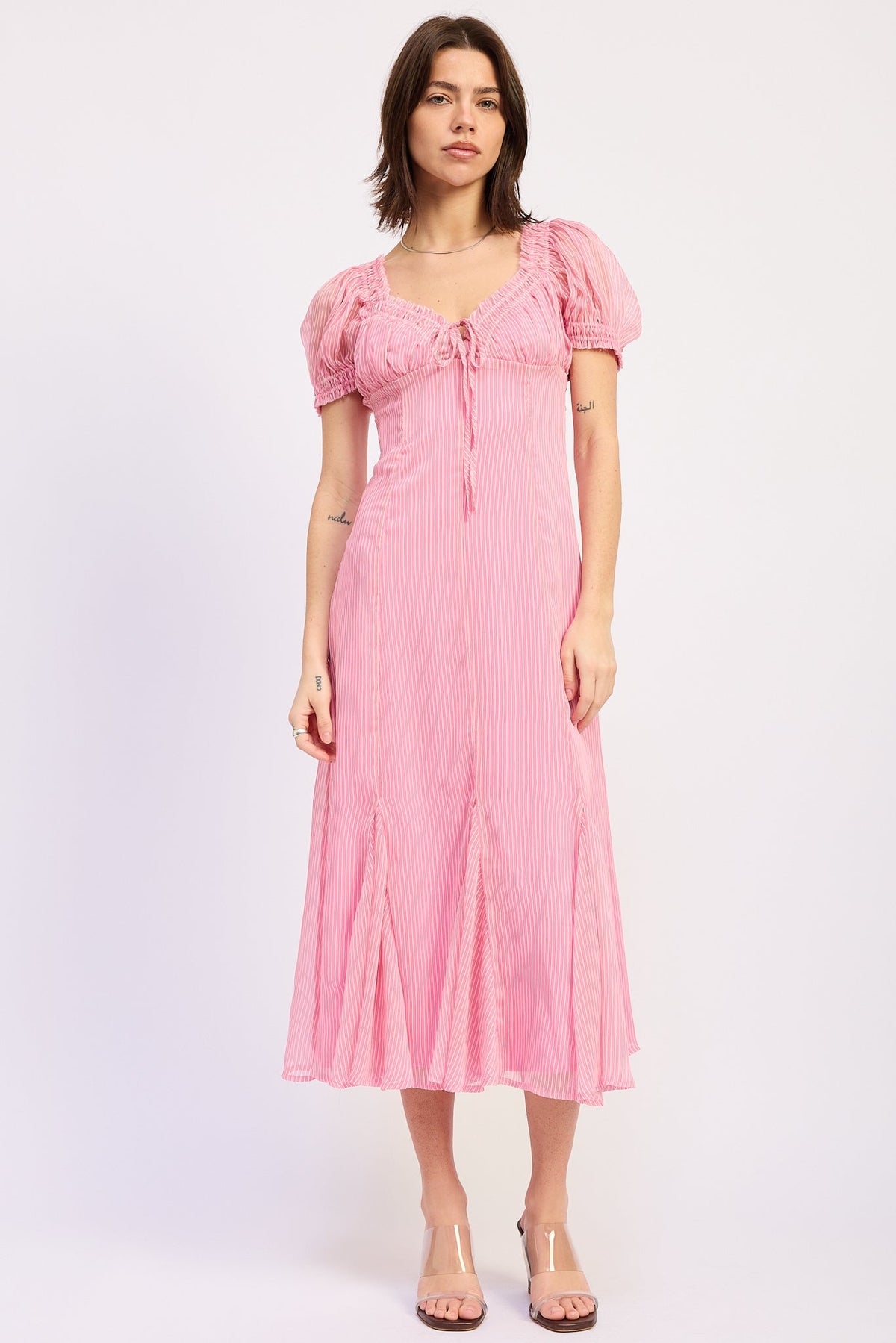 Pink Bellis Midi Dress by Emory Park featuring a flowy silhouette and elegant design.