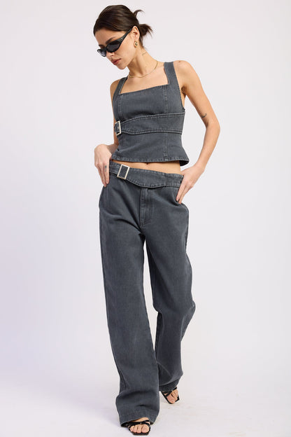 Emory Park Celandine Top in washed denim, casual women's blouse with long sleeves and relaxed fit, displayed on a hanger.
