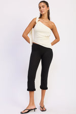 Emory Park Karla Top in ivory, casual women's blouse with soft fabric and stylish neckline, displayed on a hanger.
